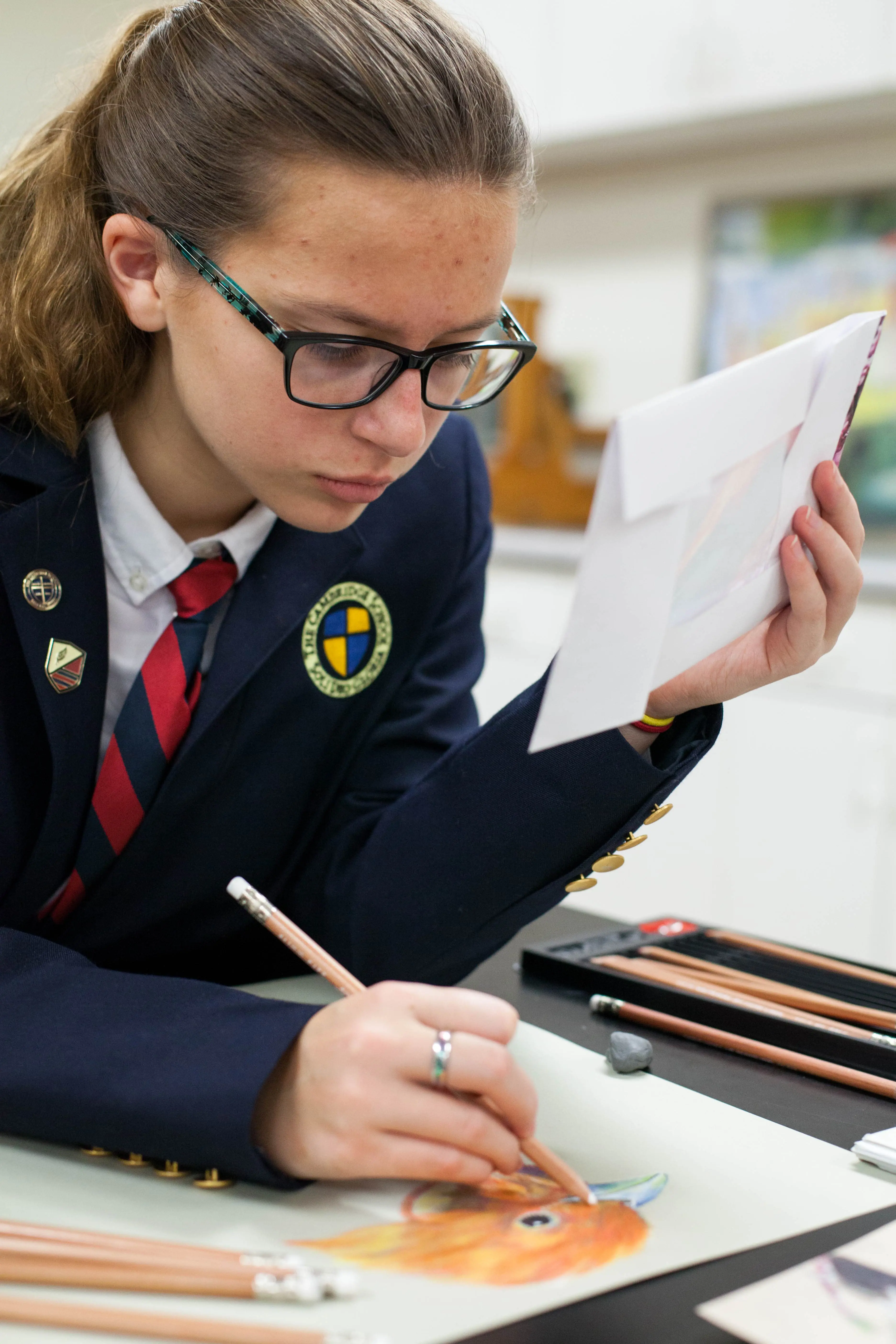 An upper school student at The Cambridge School, the top k-12 education in San Diego, reflect on order and beauty through her drawing of a bird.
