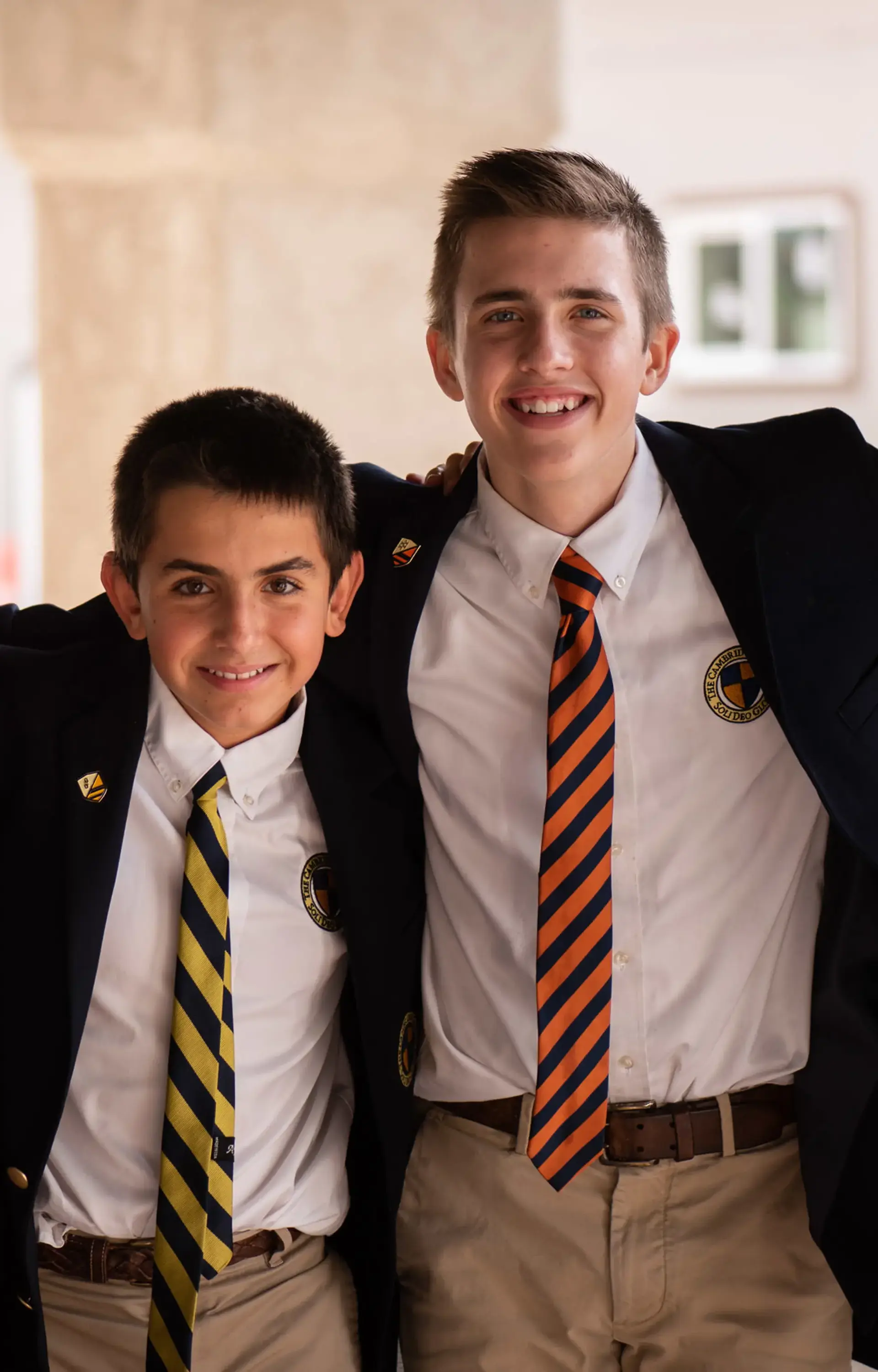 Students with arms around each other's shoulders