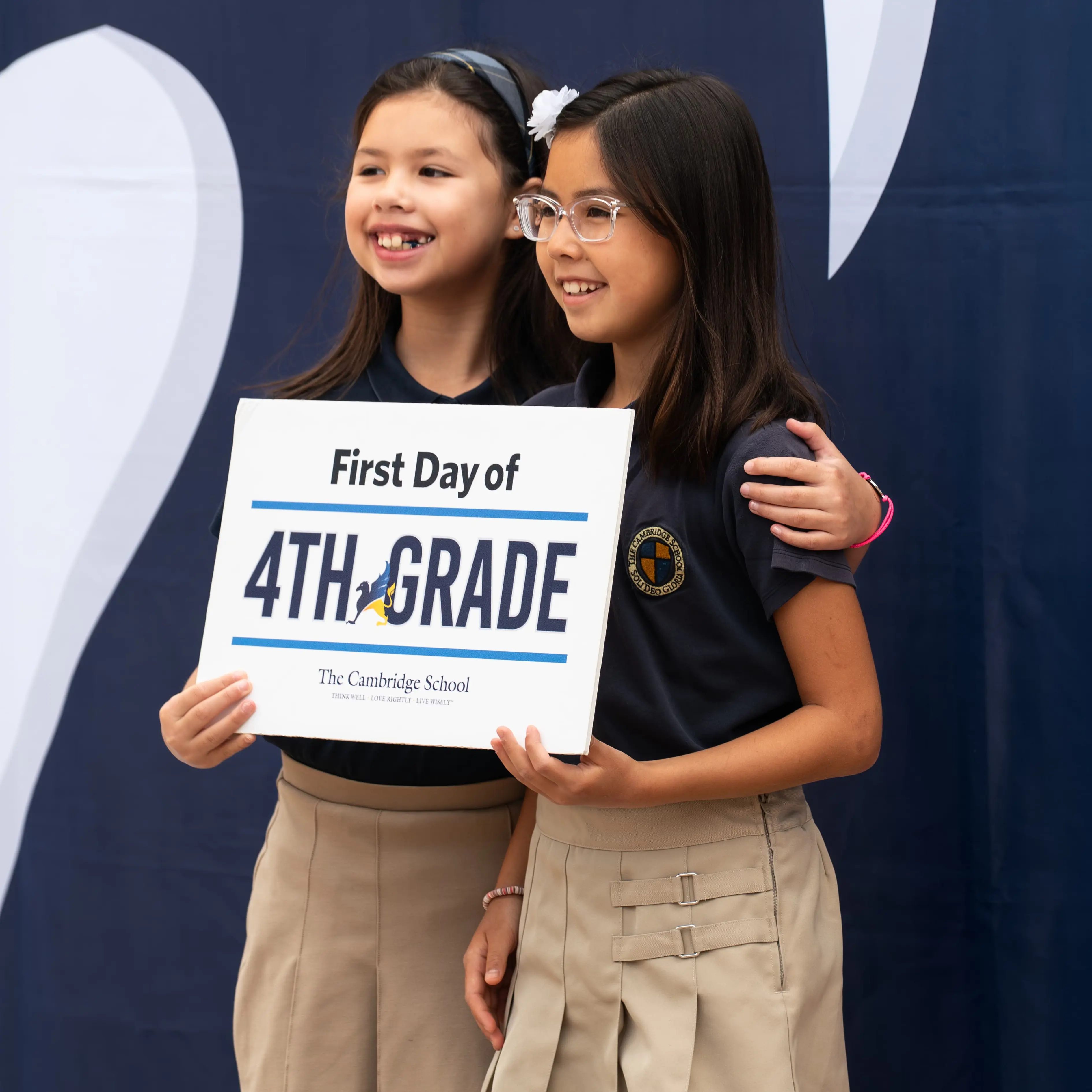 Elementary school students at The Cambridge School celebrate their first day of school.