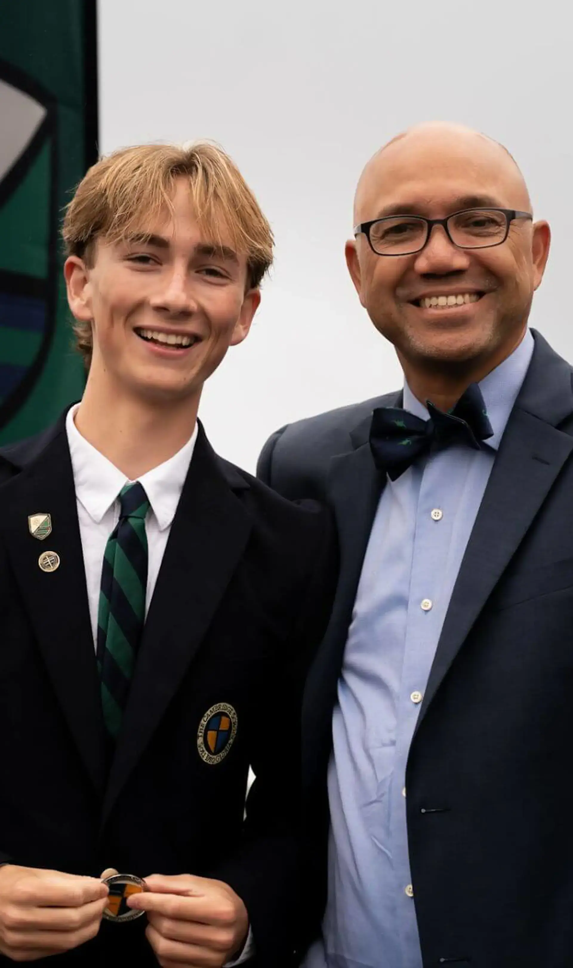 Student and teacher smiling together