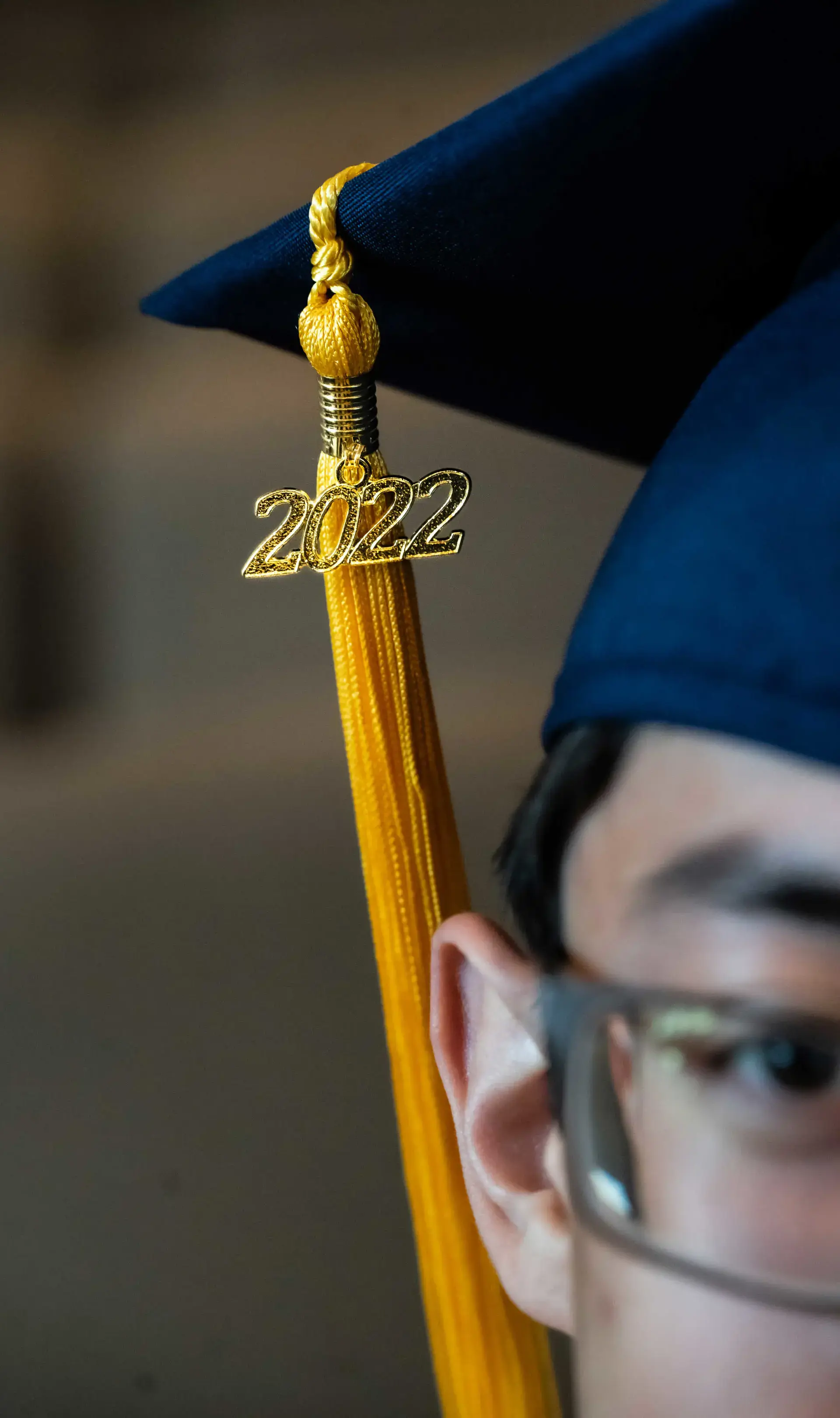 Close-up of student wearing graduation cap