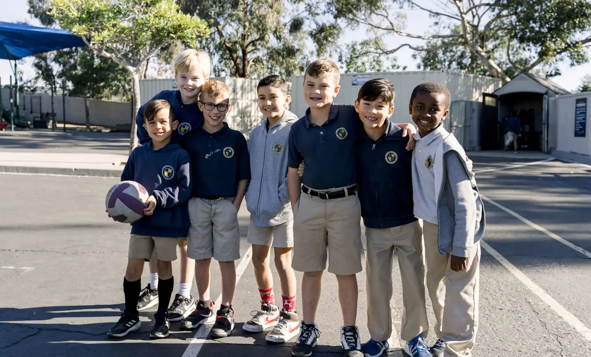 Students posing together on playground
