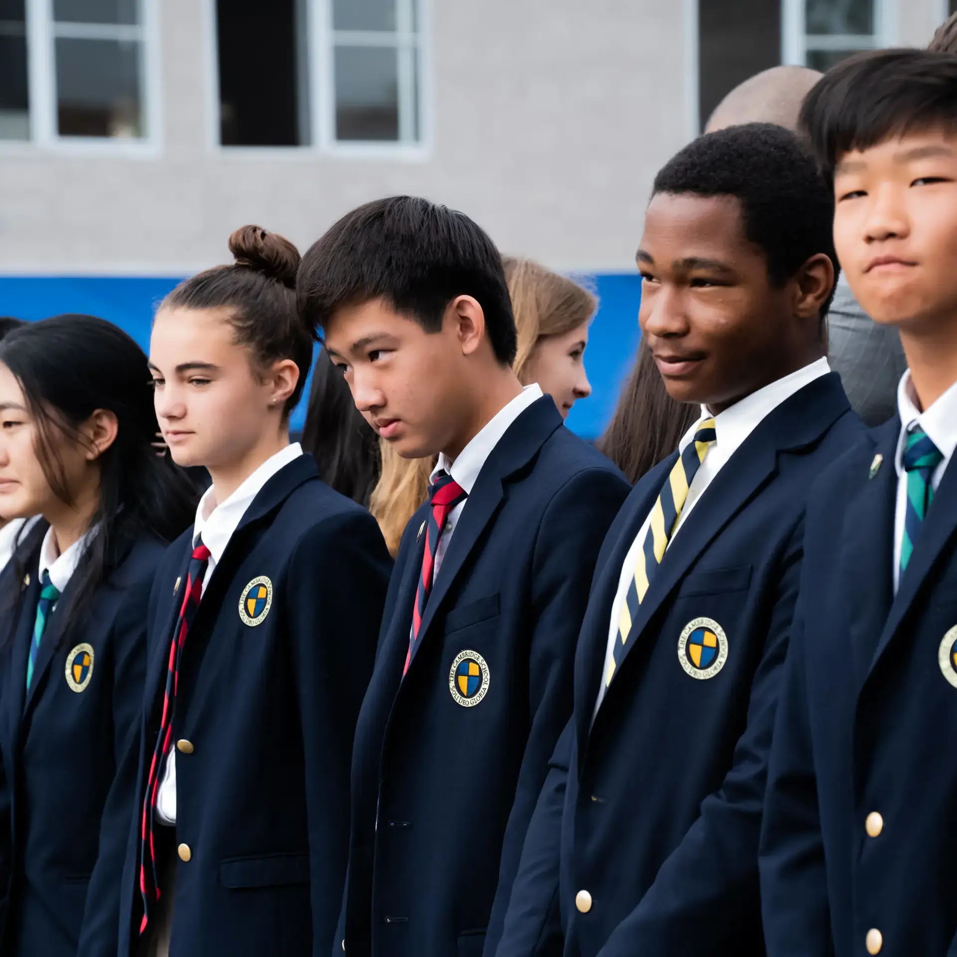High school students at The Cambridge School in San Diego, in dress uniforms during a formal school assembly.