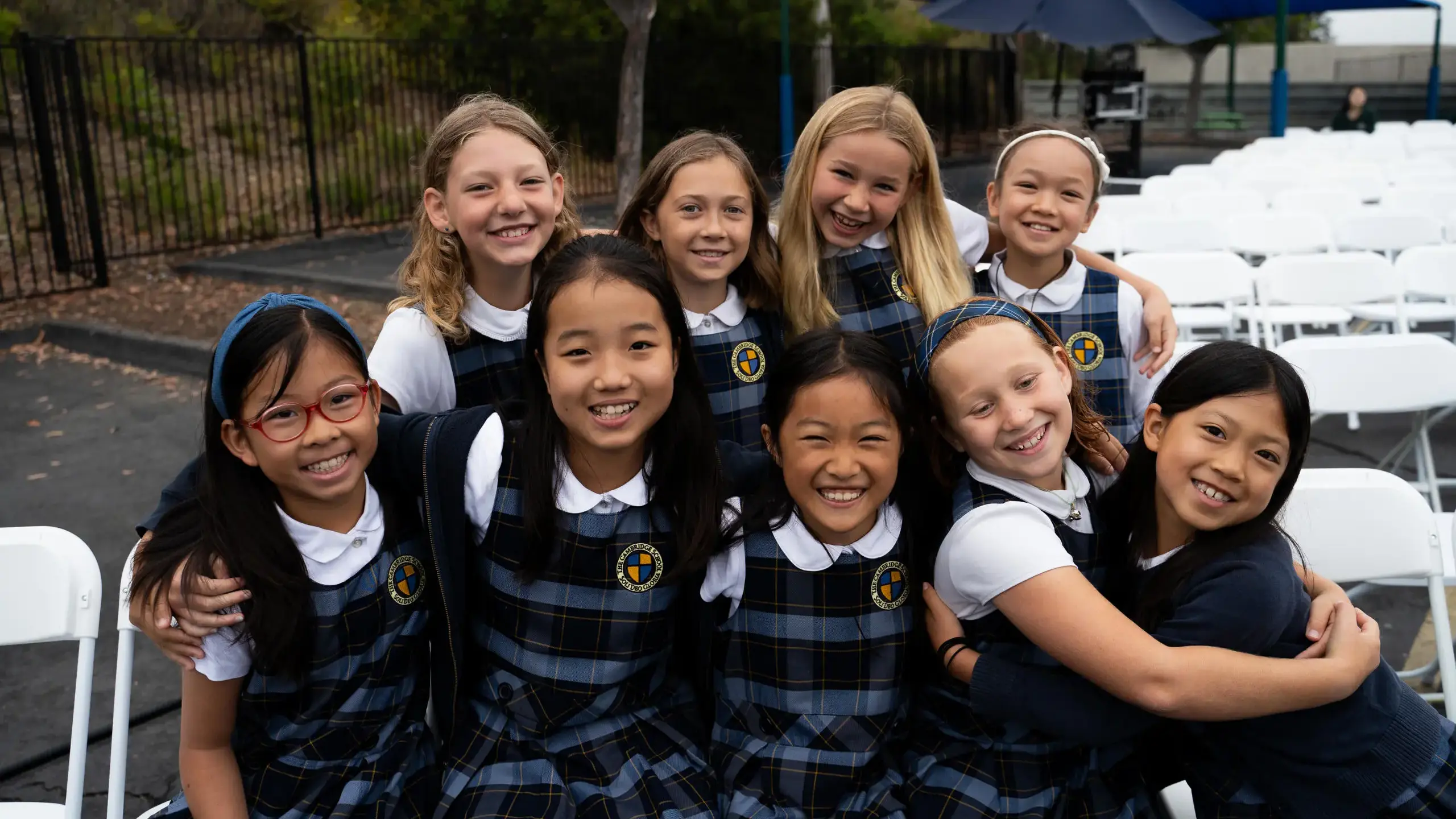 Grammar School girls at The Cambridge School, a private classical Christian school in San Diego, gather before a school program