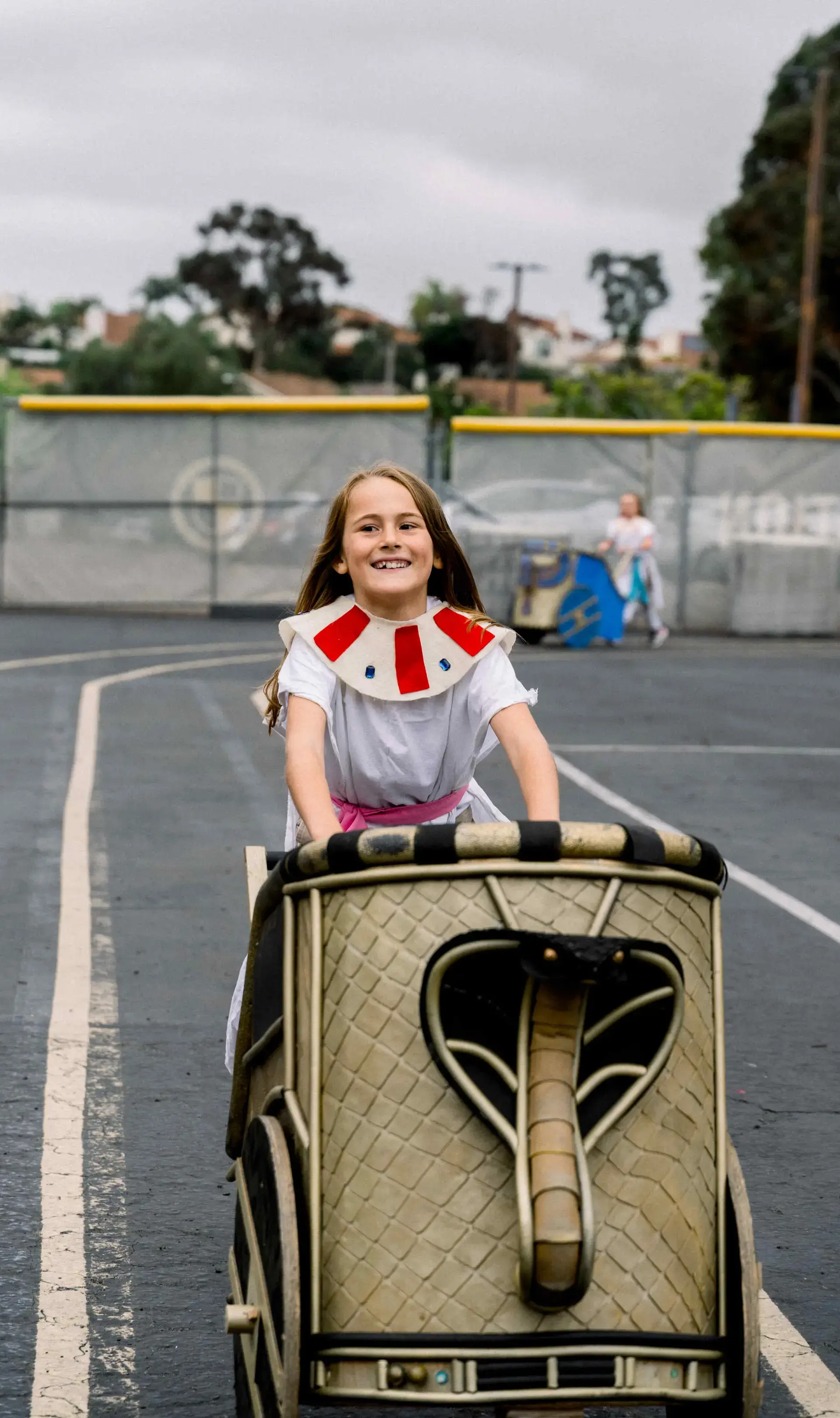 Student riding chariot
