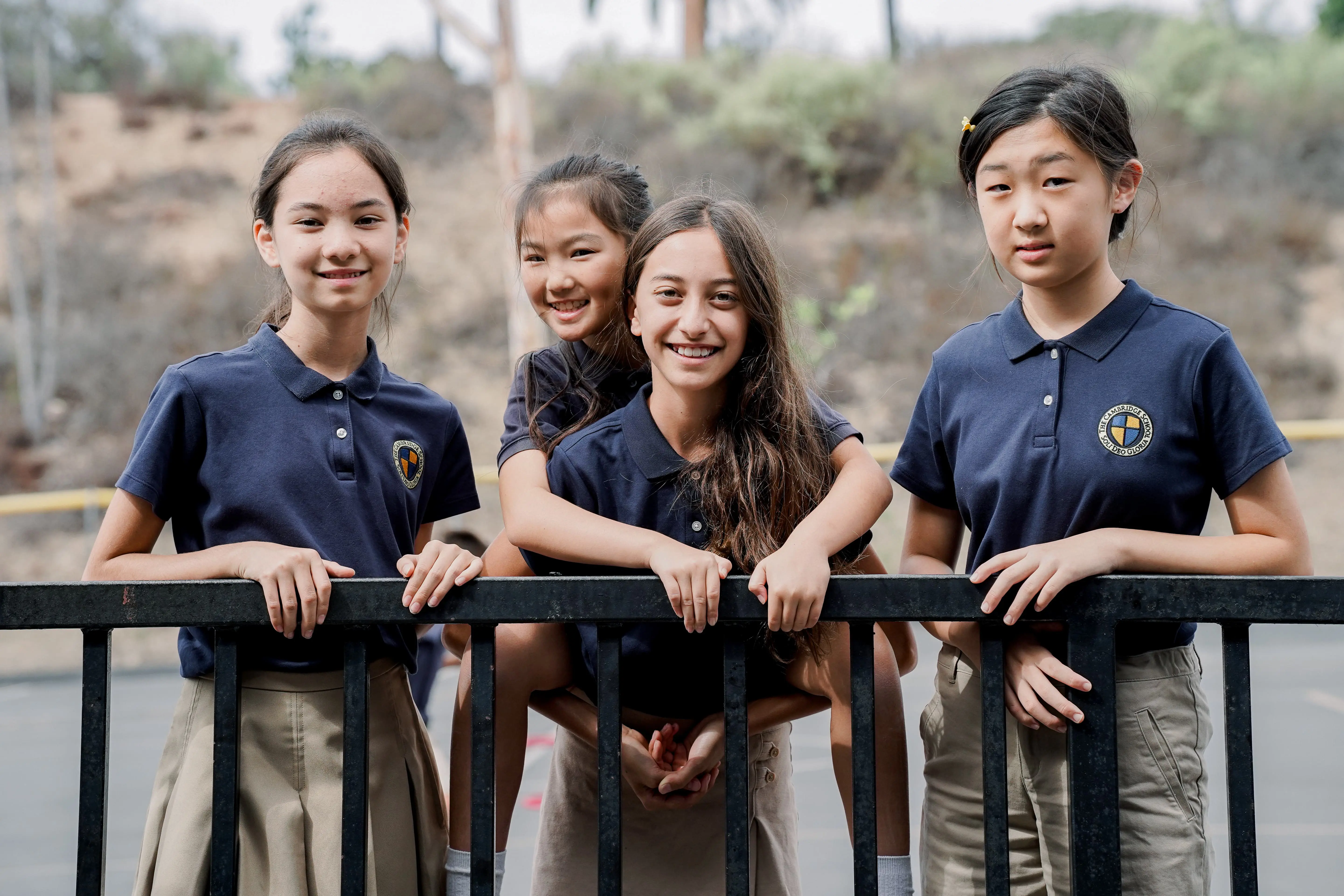 Four Grammar School students at The Cambridge School enjoy community outdoors.