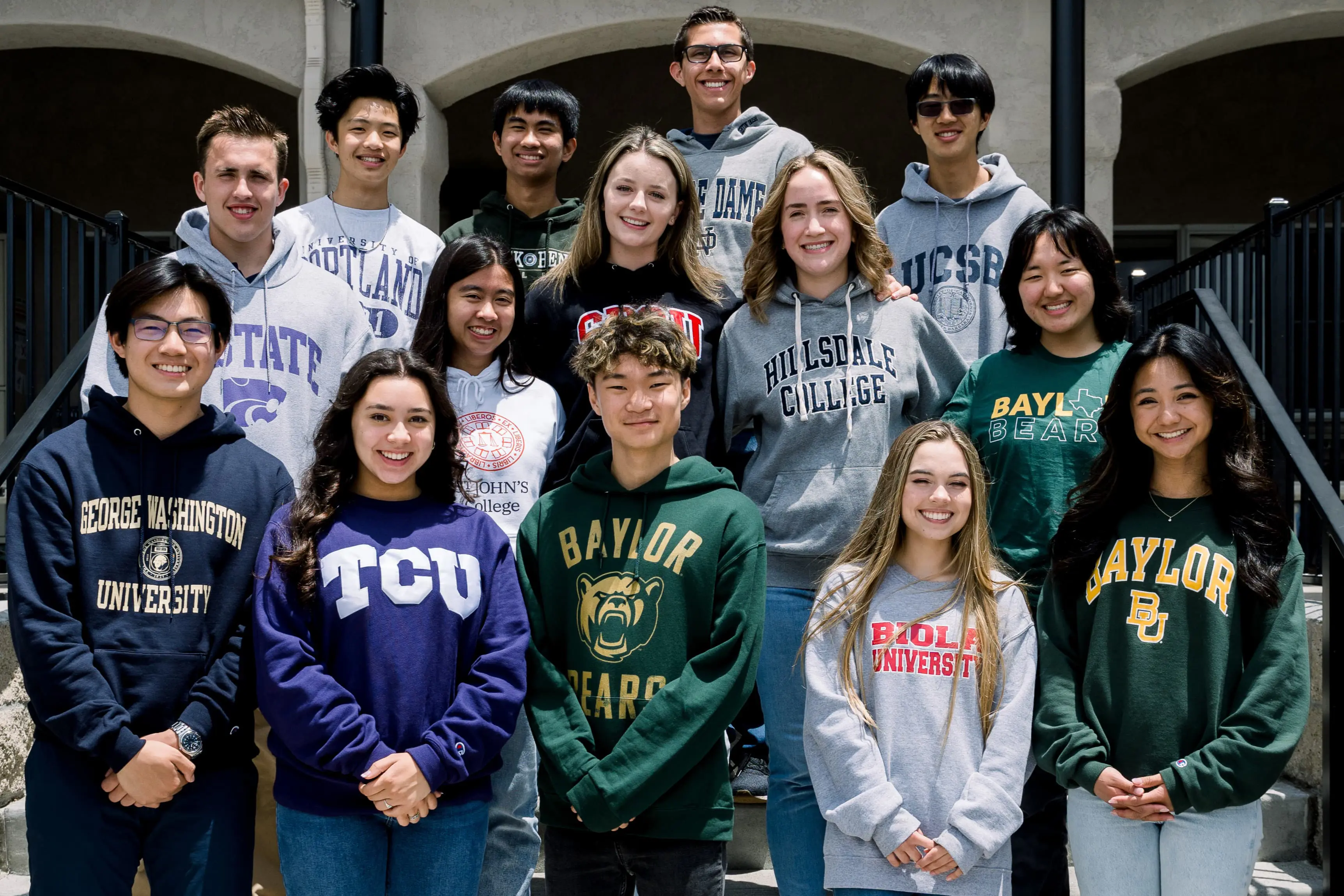 Seniors in their college sweatshirts