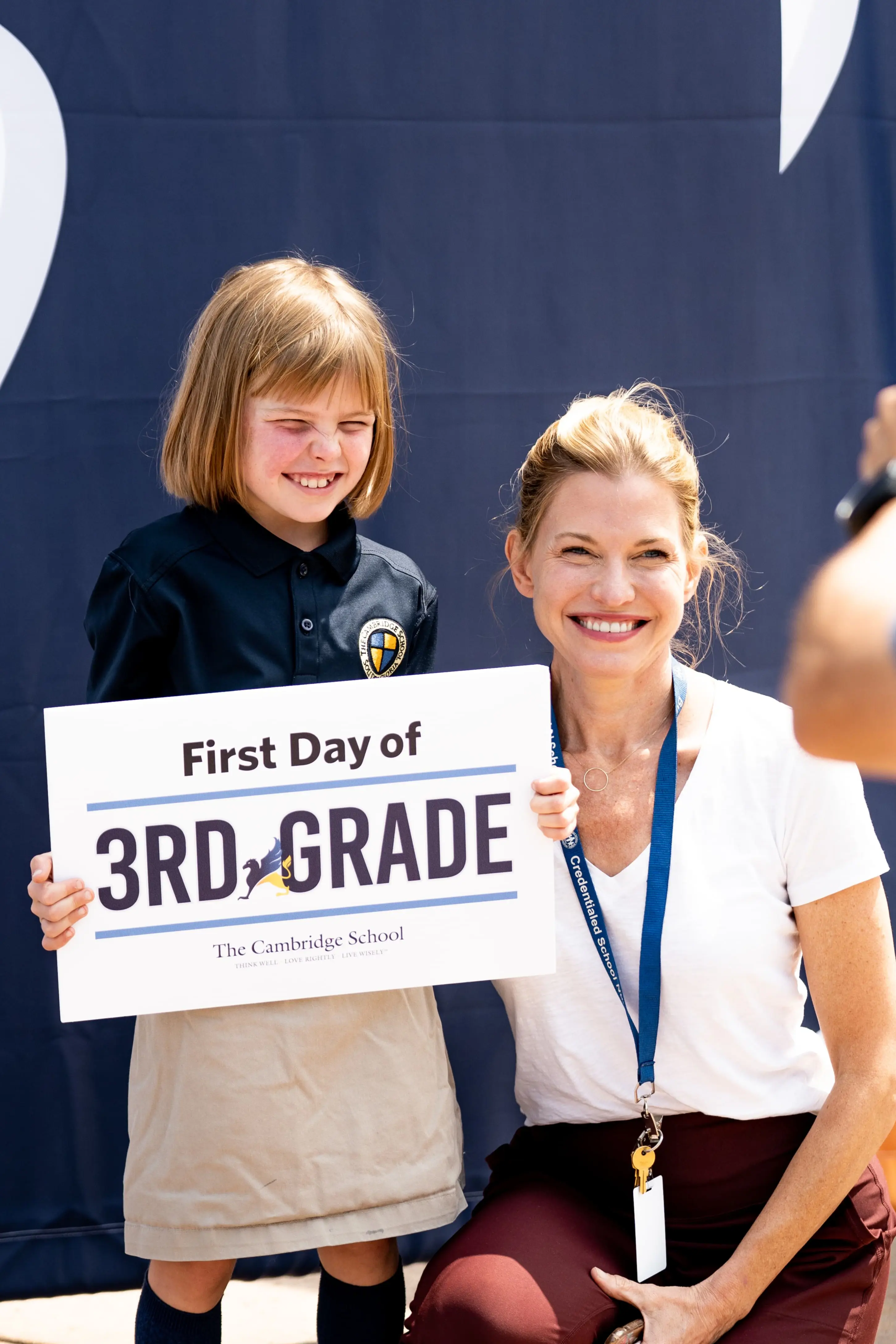 Mother and daughter join in community at The Cambridge School for the first day of a new year.