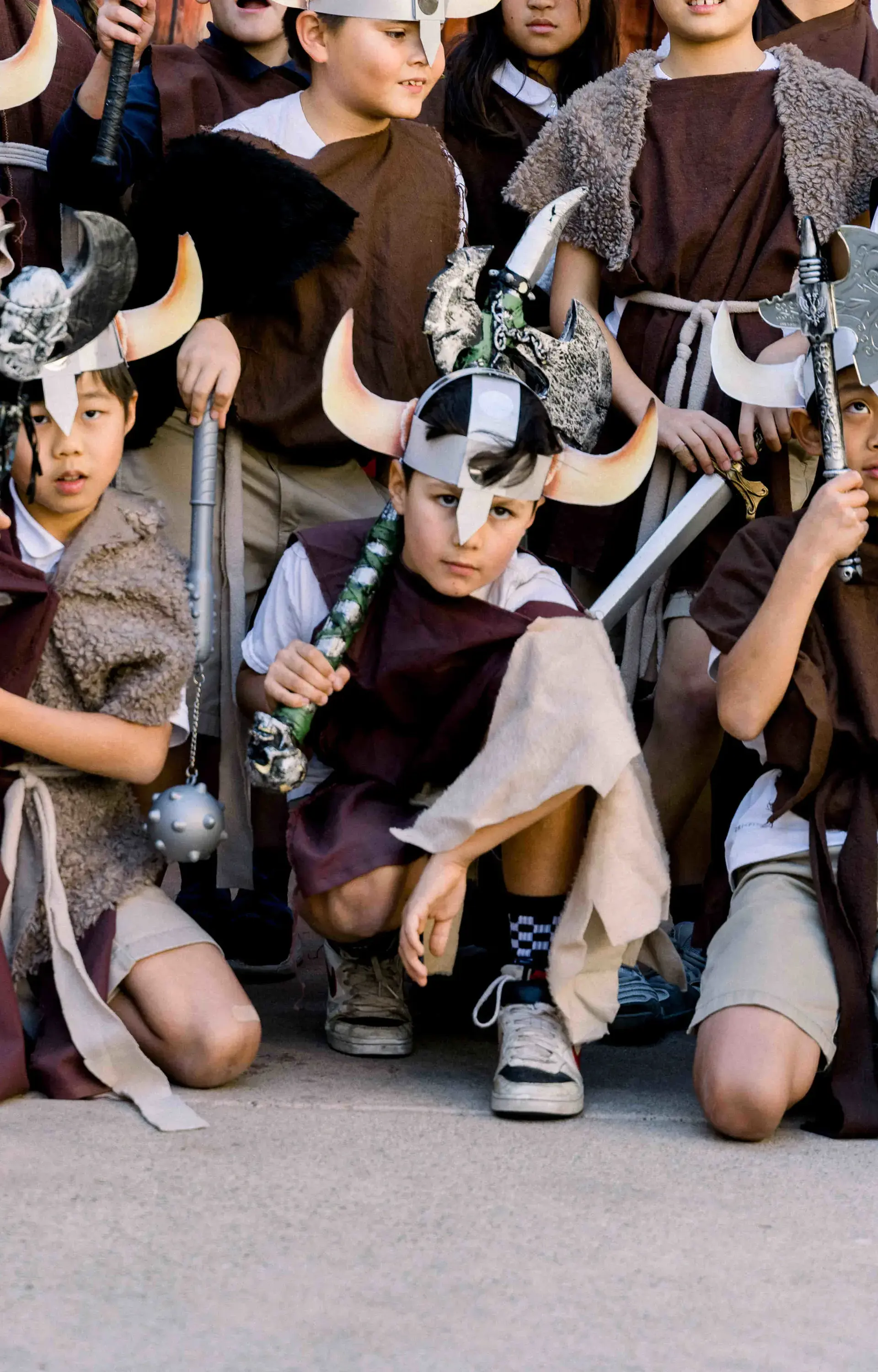 Grammar school students at The Cambridge School, a private Christian school in San Diego, dress as Vikings for Viking celebrating history, imagination, and embodied learning.