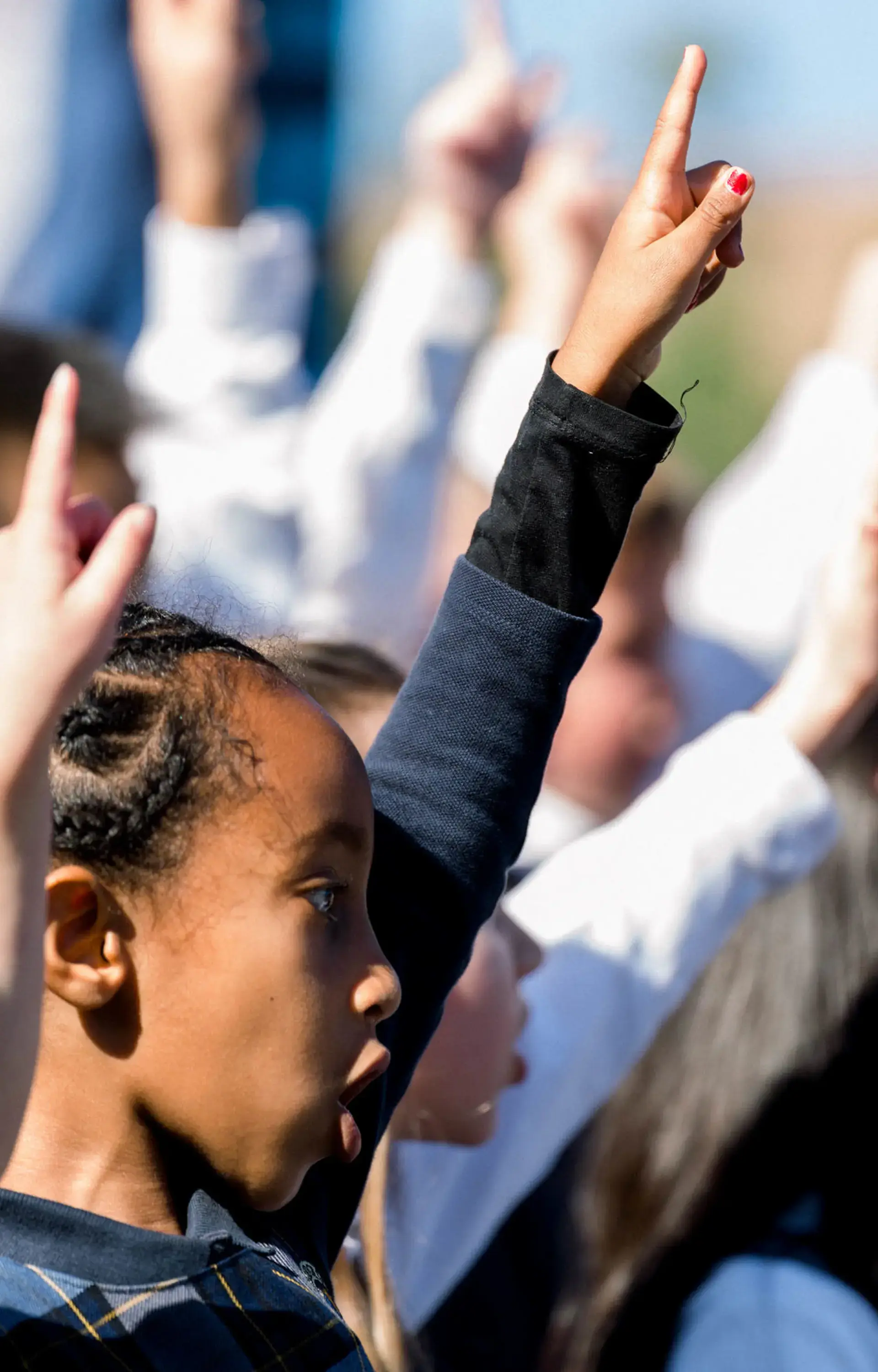 Grammar school students at The Cambridge School, a private Christian school in San Diego, perform a choreographed memory work presentation during the Easter Program.